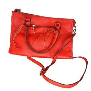 Red purse with dual straps